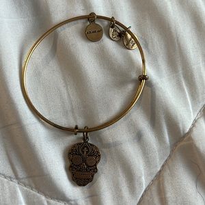 Gold skull Alex and Ani bracelet